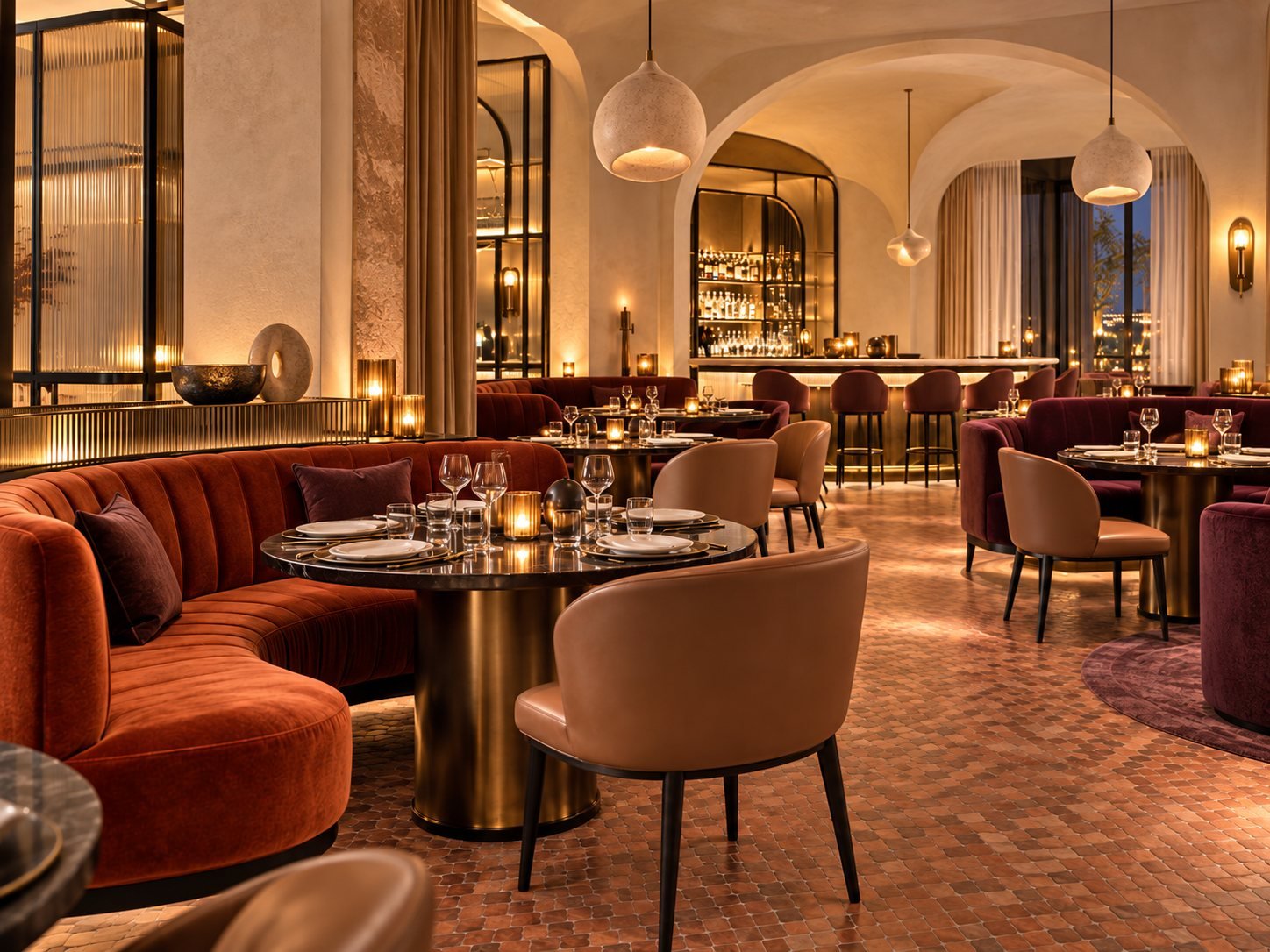 Boutique hotel restaurant with velvet banquettes and warm light